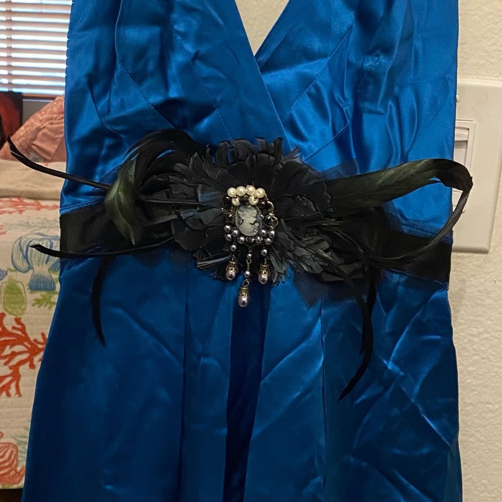 Elegant Blue Satin Dress with Black Floral Accent
